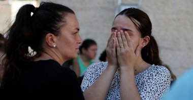 Mourners attend a funeral for Palestinians killed in an Israeli strike of the Greek Orthodox St. Porphyrius Church, where Palestinians who fled their homes were taking shelter, Gaza City, Palestine, Oct. 20, 2023. (Reuters Photo)