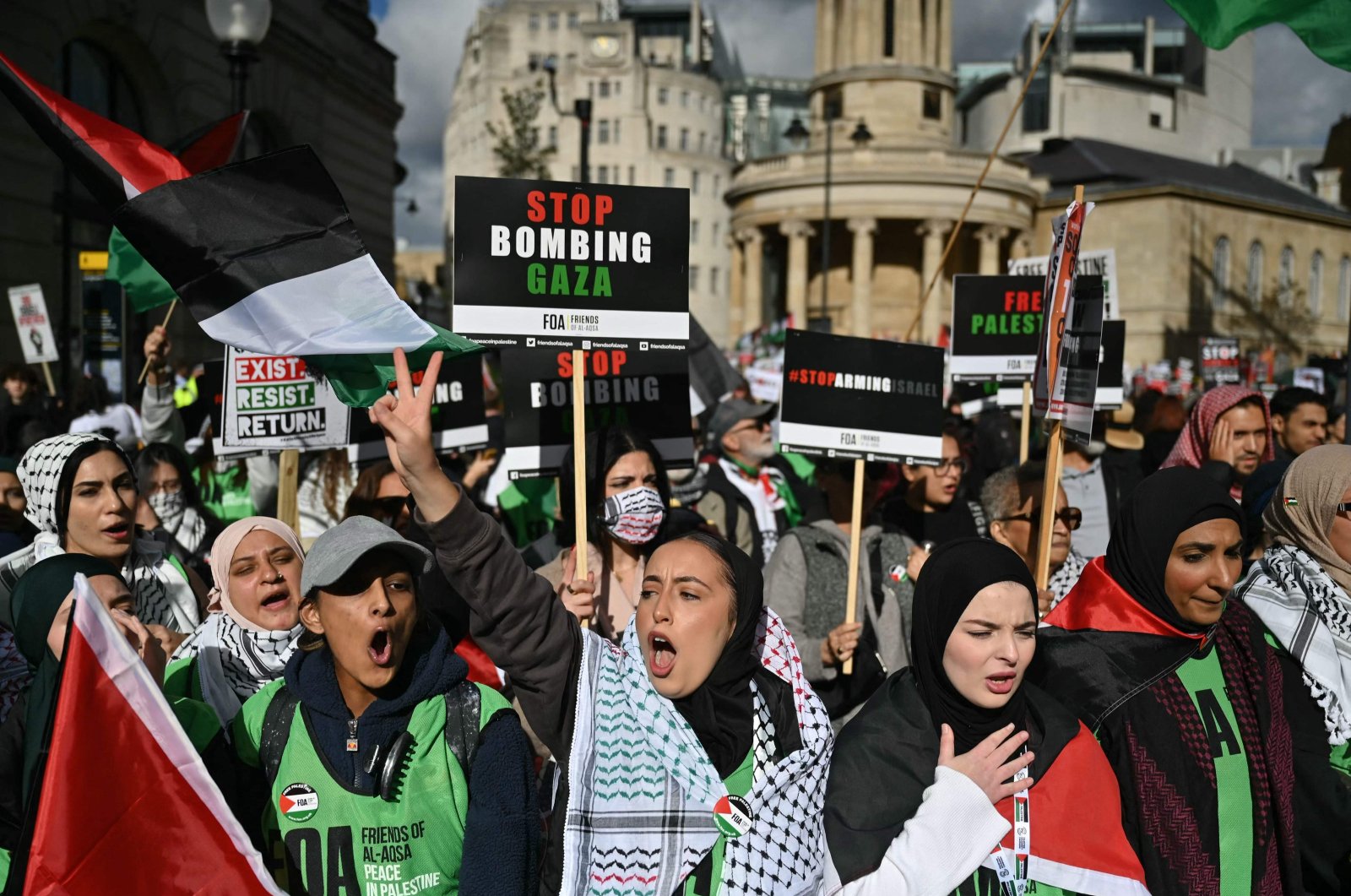 People gather with placards to take part in a March For Palestine, part of a pro-Palestinian national demonstration, in London, U.K., Oct. 14, 2023. (AFP Photo)