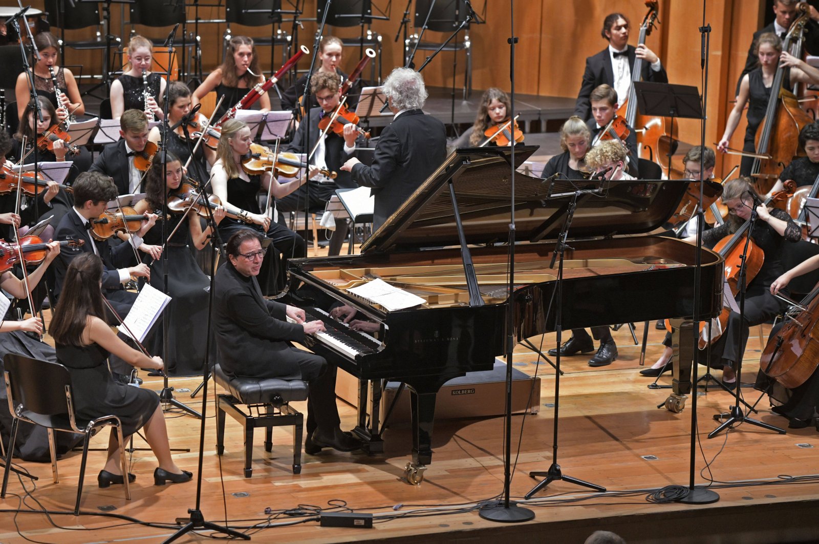 Orchestra accompanies Turkish pianist Fazıl Say on the piano, Sept. 25, 2021. (Reuters File Photo)