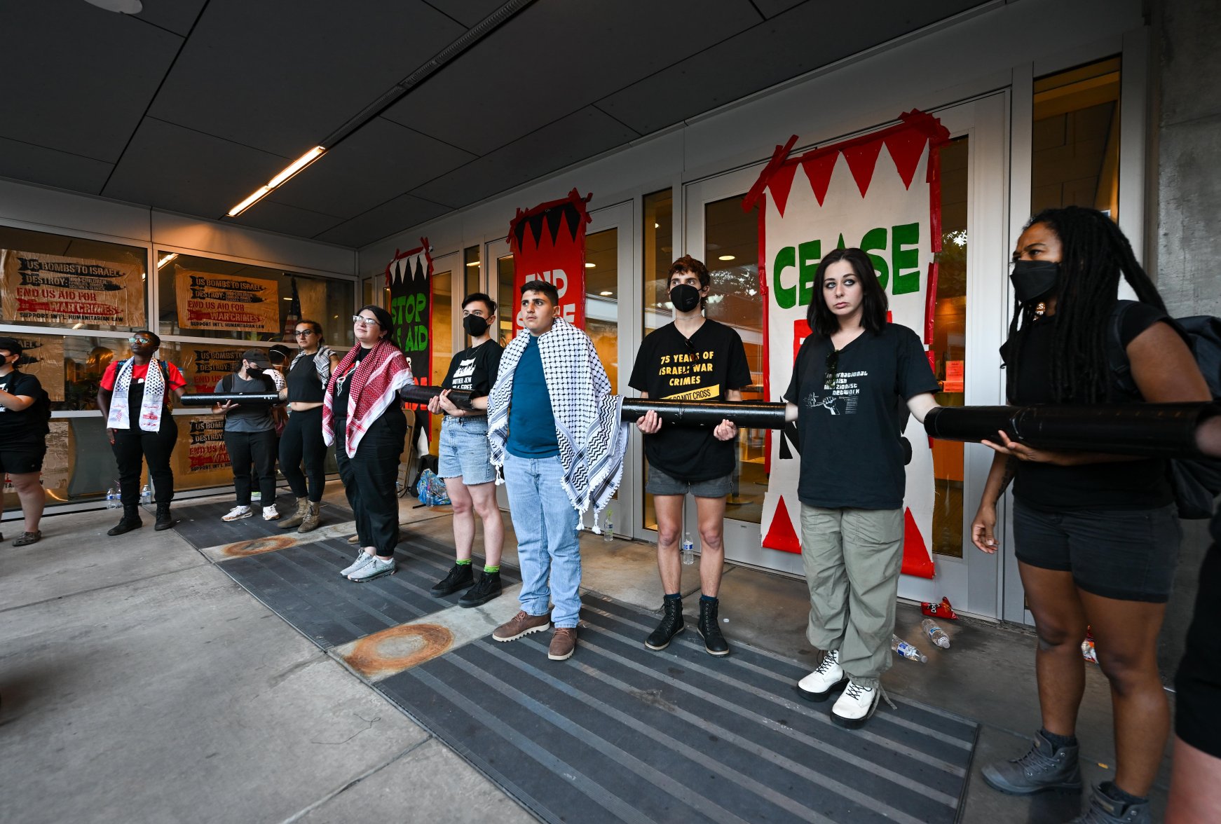 San Francisco Protest: Demonstrators chained themselves outside the ...