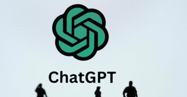 A photograph depicting figurines next to the ChatGPT, Mulhouse, eastern France, Oct. 19, 2023. (AFP Photo)