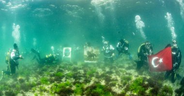Divers unfurl the Turkish flag in deep water near Dolmabahçe to celebrate the Republic of Türkiye&#039;s 100th Anniversary, Istanbul, Türkiye, Oct. 23, 2023. (IHA Photo)