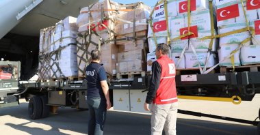 This file photo shows a Turkish military aircraft being loaded with aid for Gaza, Ankara, Türkiye, Oct. 13, 2023. (AA Photo)