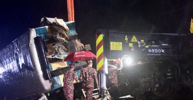 Rescue workers carry out a rescue operation after a passenger train collided with a freight train in Bhairab, some 85km east from Dhaka, on Oct. 23, 2023.(AFP Photo)