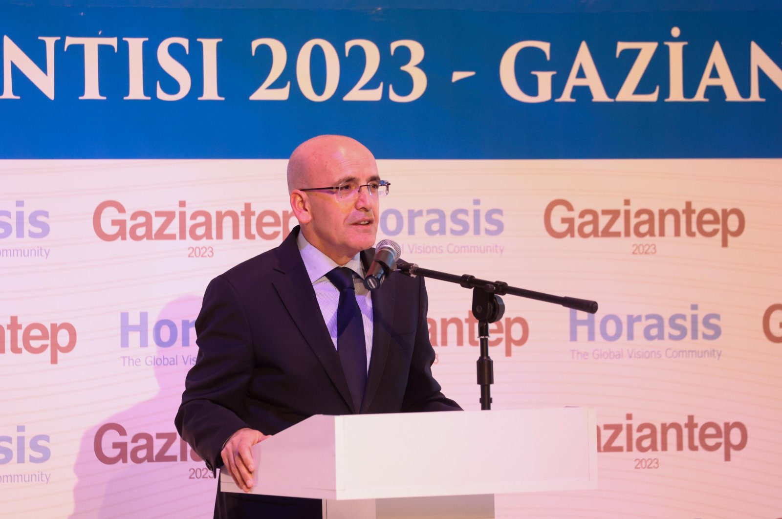 Treasury and Finance Minister Mehmet Şimşek speaks during the Horasis Global Meeting in Gaziantep province, southeastern Türkiye, Oct. 22, 2023. (IHA Photo)
