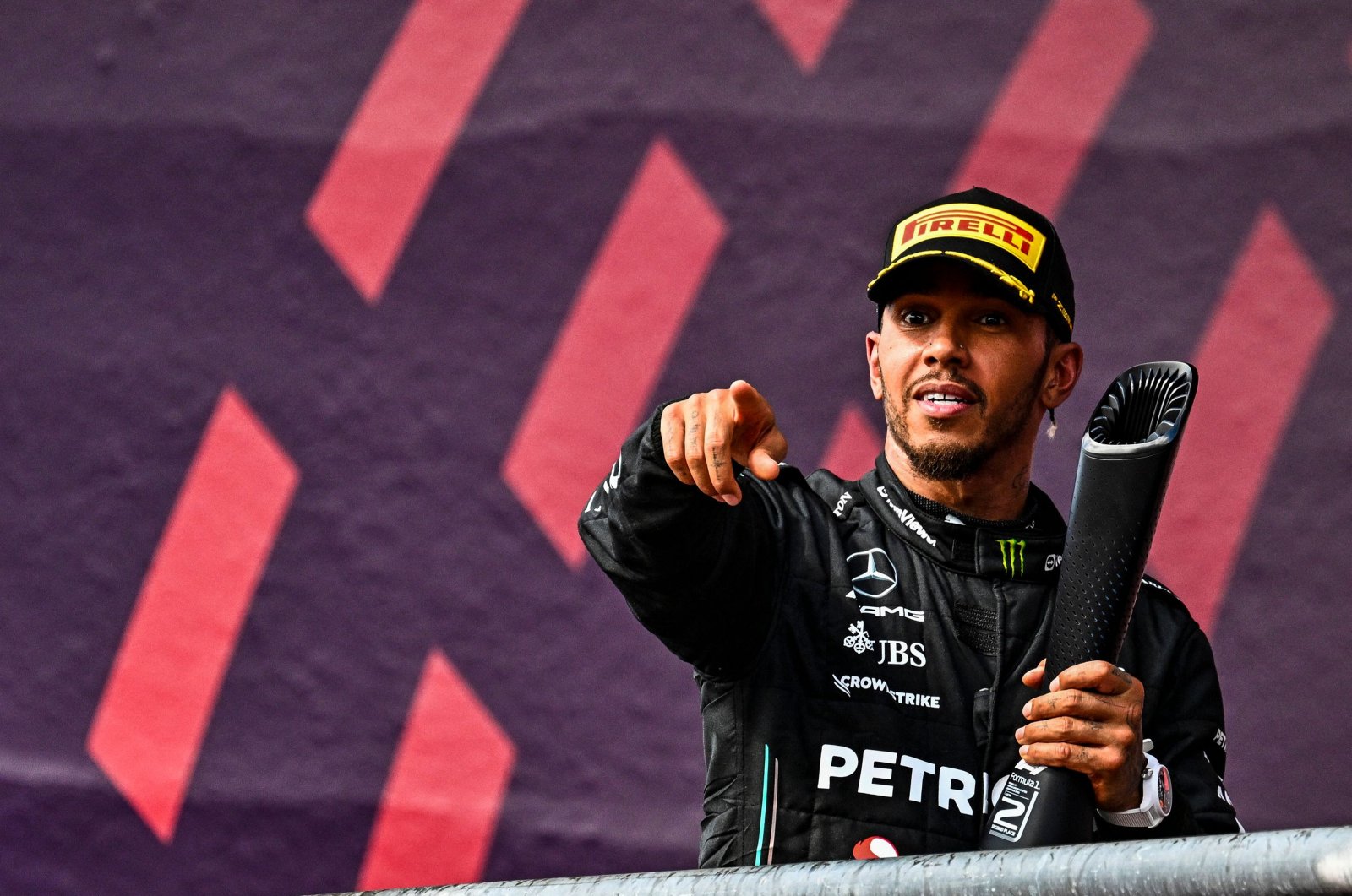 Mercedes&#039; British driver Lewis Hamilton celebrates on the podium after placing second in the 2023 U.S. Formula One Grand Prix, Circuit of the Americas, Austin, Texas, U.S., Oct. 22, 2023. (AFP Photo)