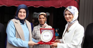 Minister of Family and Social Services Mahinur Özdemir Göktaş (R) awards women in Tekirdağ, Türkiye. (AA Photo)