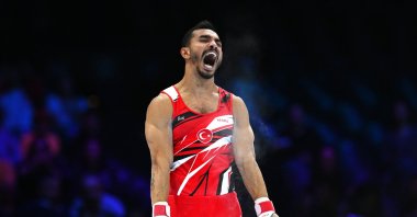 Ferhat Arican of Team Türkiye reacts after falling during his routine on parallel bars during the men's qualifications on Day One of the FIG Artistic Gymnastics World Championships at Antwerp Sportpaleis, Antwerp, Belgium, Sept. 30, 2023. (Getty Images Photo)