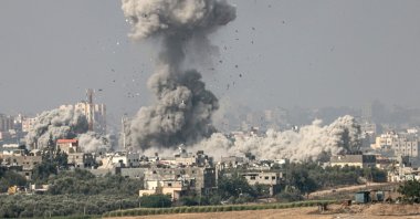 Smoke and debris ascending over the northern Gaza Strip following an Israeli strike, Sderot, Israel, Oct. 23, 2023. (AFP Photo)