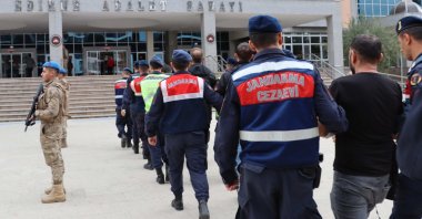 Gendarmerie officers escort six suspects linked to the Gülenist Terror Group (FETÖ) to the courthouse in the northwestern Edirne province, Türkiye, Oct. 24, 2023. (AA Photo)