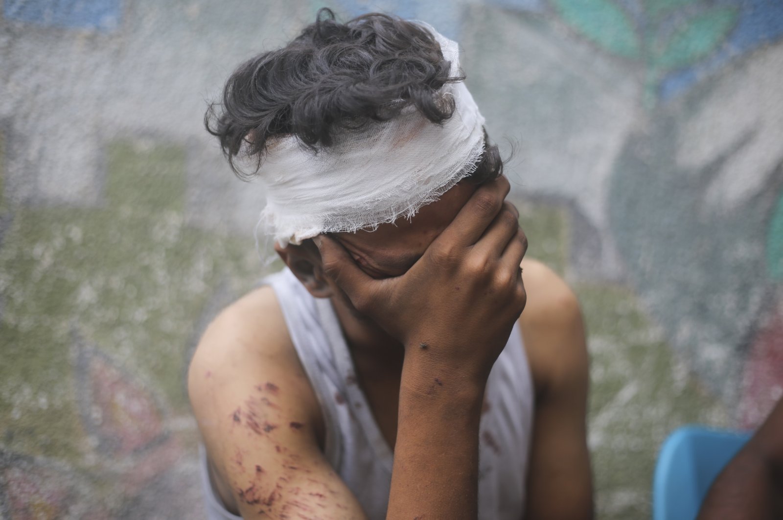 Palestinian boy mourns his relatives killed in the Israeli bombardment of the Gaza Strip in Rafah, Monday, Oct. 23, 2023. (AP Photo/Hatem Ali)