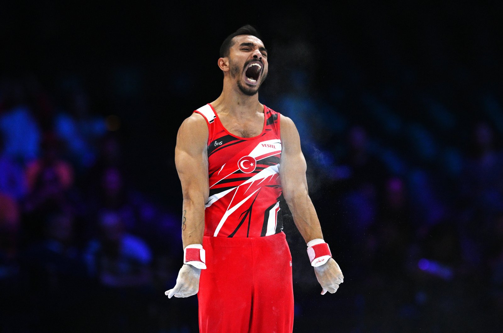 Ferhat Arican of Team Türkiye reacts after falling during his routine on parallel bars during the men&#039;s qualifications on Day One of the FIG Artistic Gymnastics World Championships at Antwerp Sportpaleis, Antwerp, Belgium, Sept. 30, 2023. (Getty Images Photo)