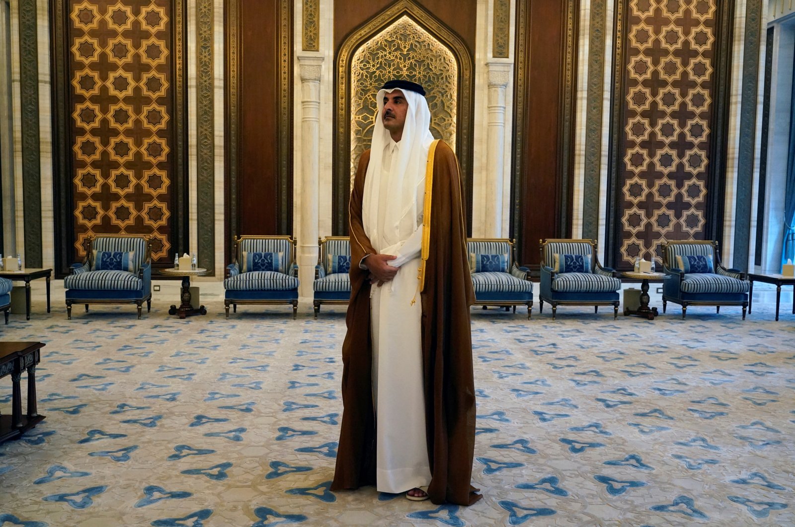 Qatari Emir Sheikh Tamim bin Hamad Al Thani waits for the arrival of U.S. Secretary of State Antony Blinken in Lusail, Qatar, Friday Oct. 13, 2023. Jacquelyn Martin/Pool via REUTERS