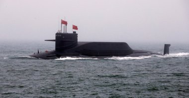 Chinese Navy's nuclear-powered submarine Long March 11 takes part in a naval parade off the eastern port city of Qingdao, to mark the 70th anniversary of the founding of the Chinese People's Liberation Army Navy, China, April 23, 2019. (Reuters Photo)