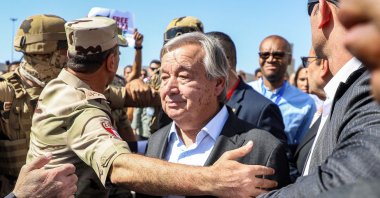 Egyptian army officers and bodyguards escort United Nations Secretary-General Antonio Guterres to his vehicle during his visit to the Egyptian side of the Rafah border, Sinai, Egypt, Oct. 20, 2023. (AFP Photo)