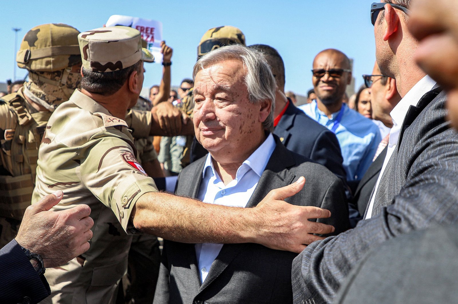 Egyptian army officers and bodyguards escort United Nations Secretary-General Antonio Guterres to his vehicle during his visit to the Egyptian side of the Rafah border, Sinai, Egypt, Oct. 20, 2023. (AFP Photo)