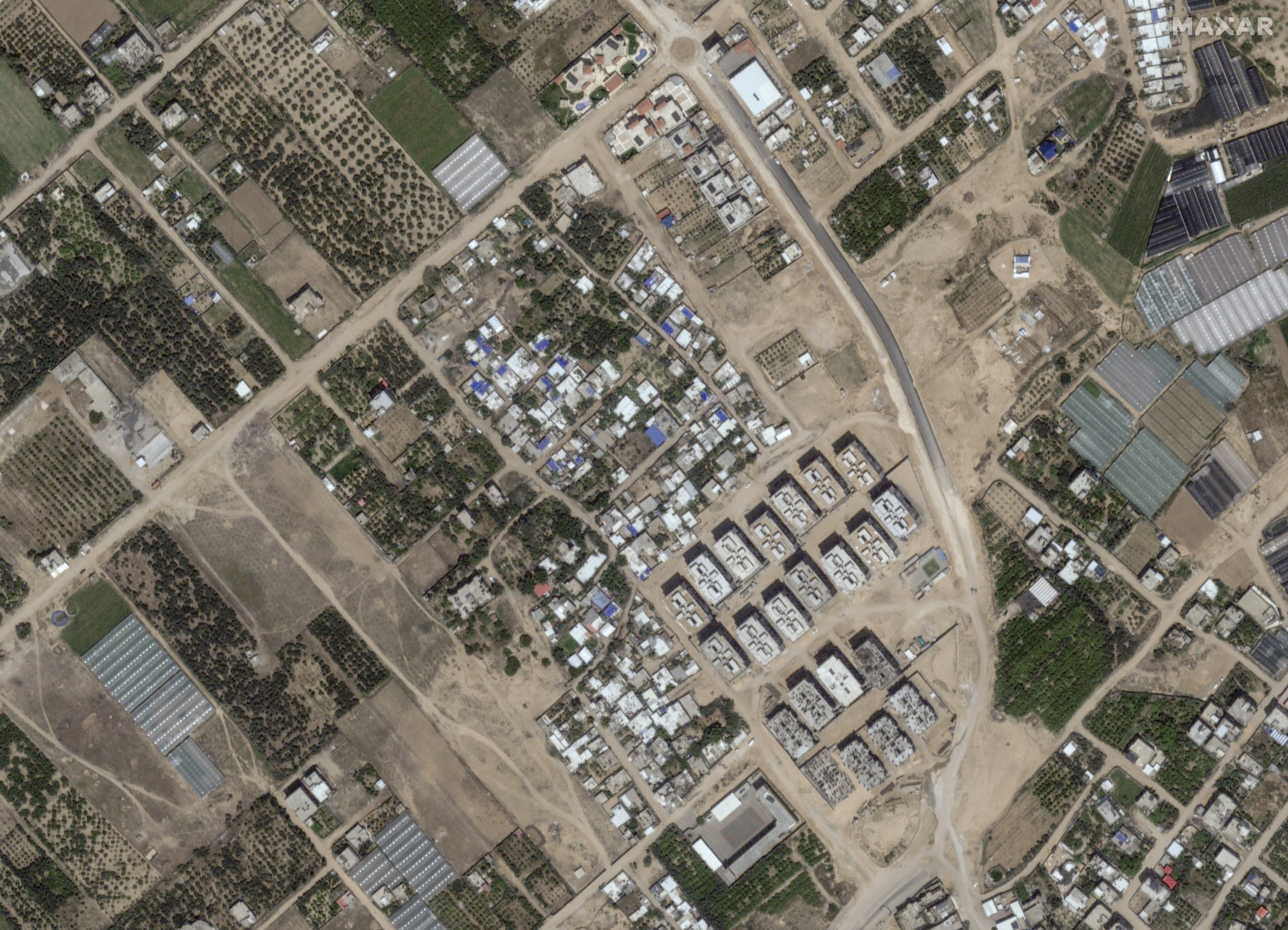 This image provided by Maxar Technologies shows before significant damage in Atatra, northern Gaza, May 10, 2023. (Satellite image ©2023 Maxar Technologies via AP)