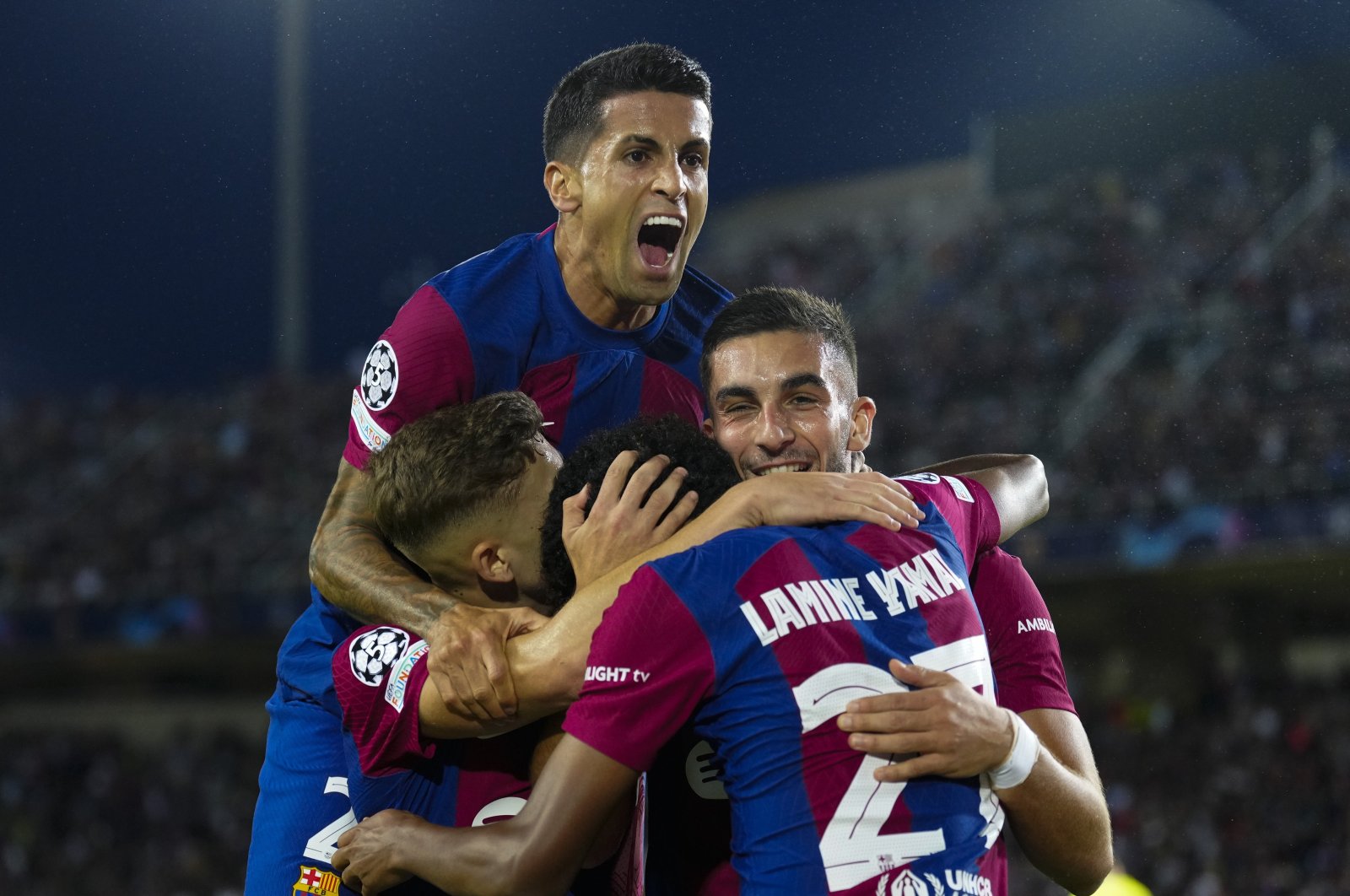Barcelona&#039;s striker Ferran Torres (R) jubilates with his teammates after scoring 1-0 during their UEFA Champions League Group H soccer match between FC Barcelona and Shaktar Donetsk at Montjuic stadium in Barcelona, Catalonia, Spain, Oct. 25, 2023. (EPA Photo)
