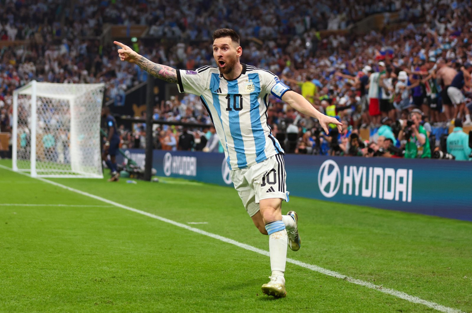 Lionel Messi of Argentina celebrates scoring the 3rd goal during the FIFA World Cup Qatar 2022 Final match between Argentina and France at Lusail Stadium, Lusail City, Qatar, Dec. 18, 2022. (Photo by Marc Atkins/Getty Images)