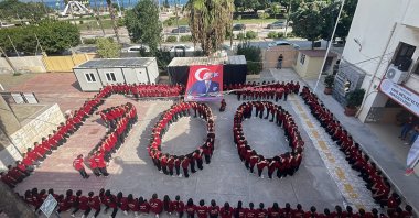 High school students form a "100" in honor of Türkiye's 100th anniversary as a republic in southern Hatay province, Oct. 26, 2023. (AA Photo)