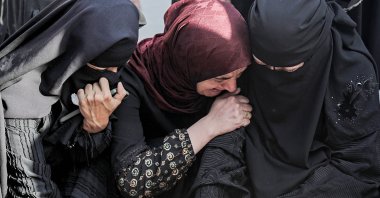 Relatives of Palestinians killed by Israeli strikes mourn next to their bodies at the Nasser Hospital in Khan Yunis, southern Gaza Strip, Palestine, Oct. 27, 2023. (EPA)