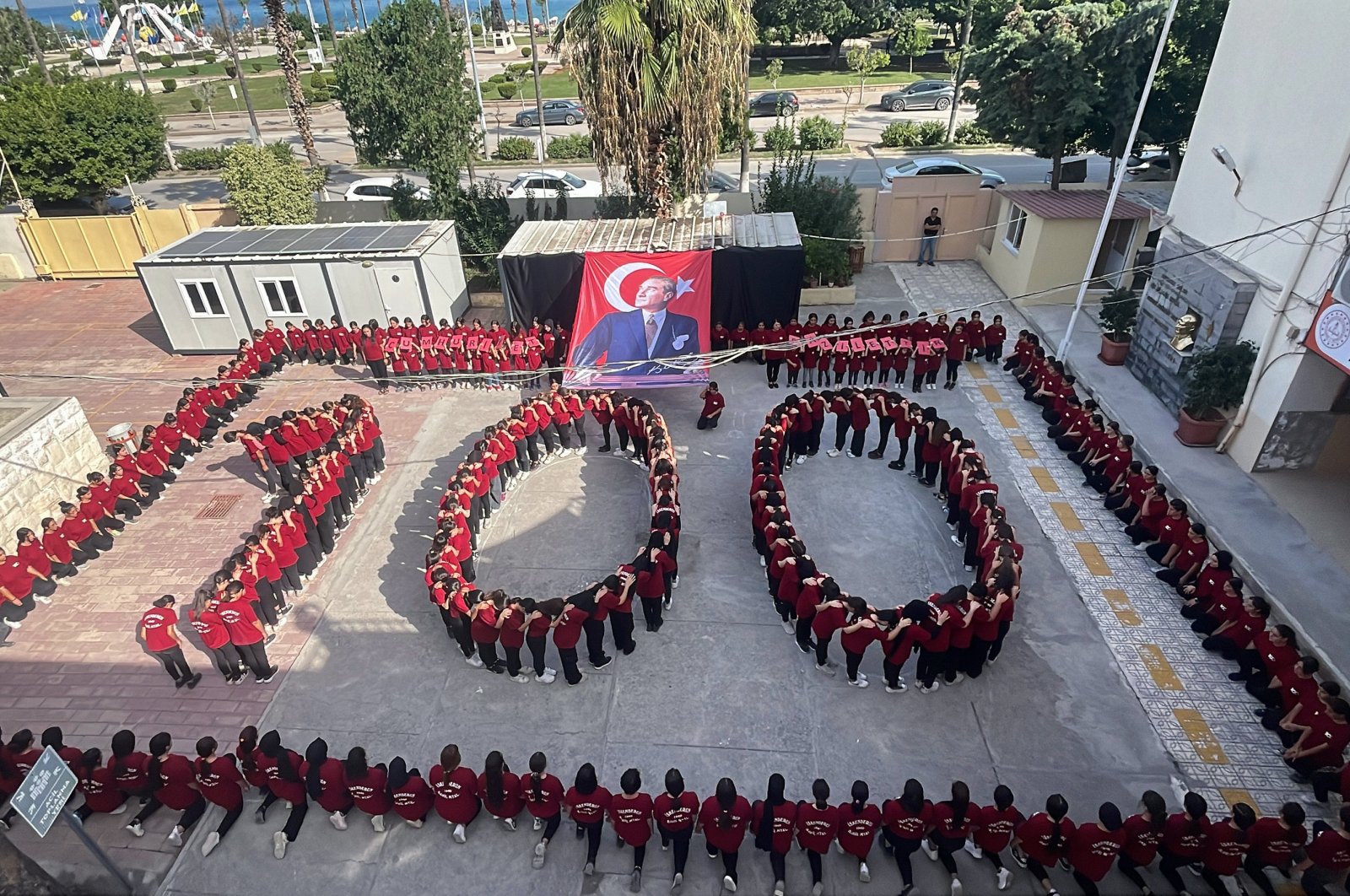High school students form a &quot;100&quot; in honor of Türkiye&#039;s 100th anniversary as a republic in southern Hatay province, Oct. 26, 2023. (AA Photo)