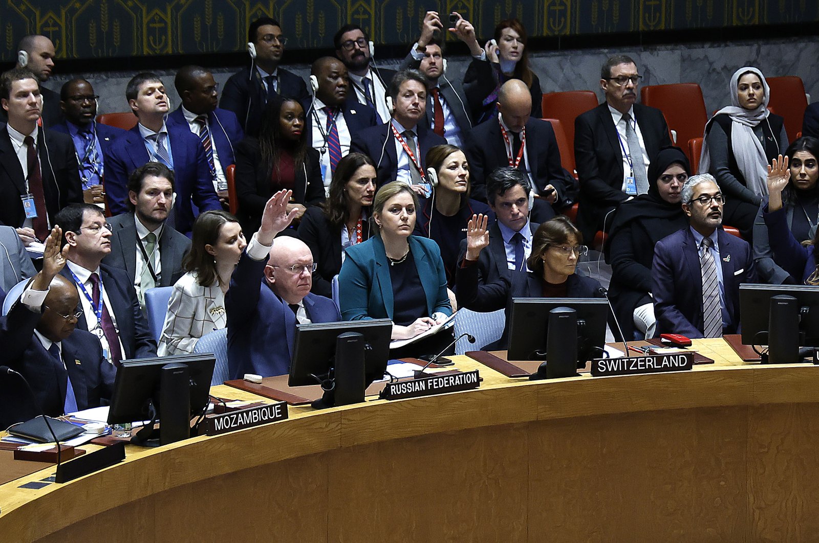 Russian representative to the United Nations Vassily Nebenzia and Pascale Baeriswyl, Permanent Representative of Switzerland to the U.N. vote during the Security Council meeting on the status of the Palestinians and the current situation in the Middle East at the United Nations Headquarters, NewYork, Oct.18, 2023. (Getty Images Photo)