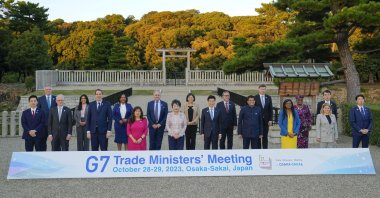 Participants including Japan&#039;s Minister of Economy, Trade and Industry Yasutoshi Nishimura and Foreign Minister Yoko Kamikawa in a family photo session at the G-7 Trade Ministers&#039; Meeting at Daisen-ryo Kofun (Tomb of Emperor Nintoku) in Sakai, Osaka, Japan, Oct. 28, 2023. (Kyodo via Reuters)
