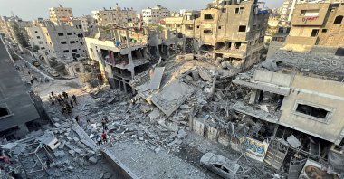 Palestinians search for casualties at the site of Israeli strikes on houses, in Gaza City, Palestine, Oct. 28, 2023. (Reuters Photo)