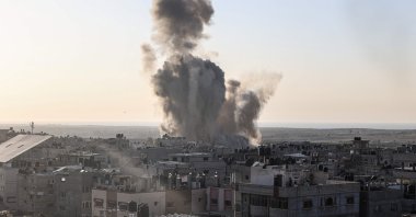 Smoke and dust rise following an Israeli air strike in Rafah, in the southern Gaza Strip on Oct. 30, 2023. (AFP Photo)