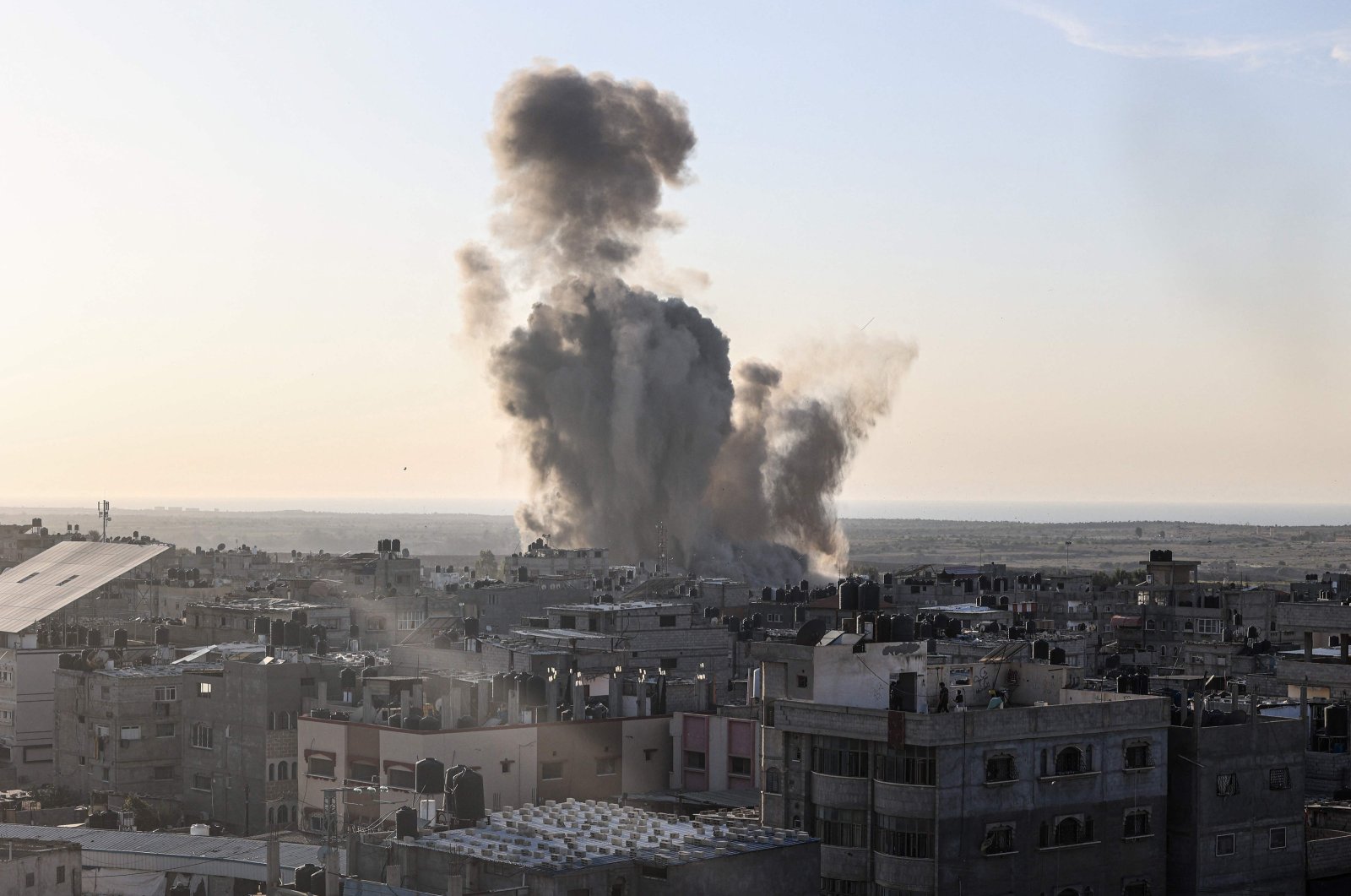 Smoke and dust rise following an Israeli air strike in Rafah, in the southern Gaza Strip on Oct. 30, 2023. (AFP Photo)