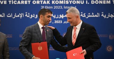 Trade Minister Ömer Bolat (R) and his Emirati counterpart Thani bin Ahmed Al Zeyoudi after singing an agreement during the Türkiye-UAE Joint Economic and Trade Committee (JETCO) 1st Term Meeting, in Istanbul, Türkiye, Oct. 31, 2023. (AA Photo)