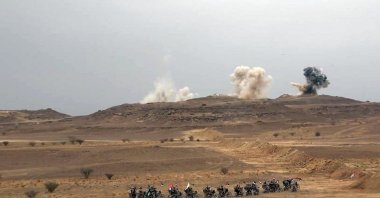 A handout photo made available by the Houthis media center shows Houthi fighters taking part in a military maneuver to express solidarity with the Palestinian people on the outskirts of Sana'a, Yemen, Oct. 29, 2023 (EPA Photo)