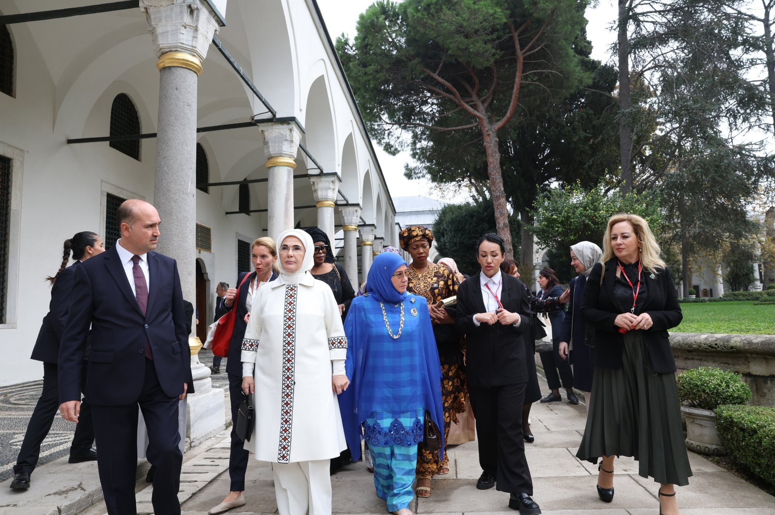 First lady Emine Erdoğan, and her counterparts from other countries are seen in the courtyard of Topkapı Palace in Istanbul, Oct. 31, 2023. (AA Photo)