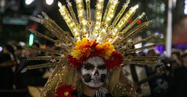 A person dressed for the Day of the Dead marches in the annual New York City Village Halloween Parade on Sixth Avenue in New York, New York, U.S., Oct 31, 2023. (EPA Photo)