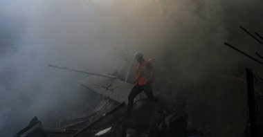 This file photo shows a Palestinian civil defense personnel work at the site of an Israeli rocket attack in Al-Shati refugee camp, west of Gaza City, Palestine, Oct. 14, 2023. (EPA Photo)