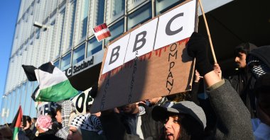 Protesters gather outside the BBC Scotland building as people take part in a demonstration to show solidarity with the Palestinian People, in Glasgow, Scotland, Oct. 14, 2023. (AFP Photo)