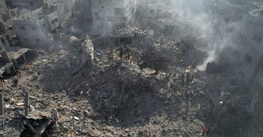 Palestinians gather at the site of Israeli strikes on houses in Bureij in the central Gaza Strip, Palestine, Nov. 2, 2023. (Reuters Photo)