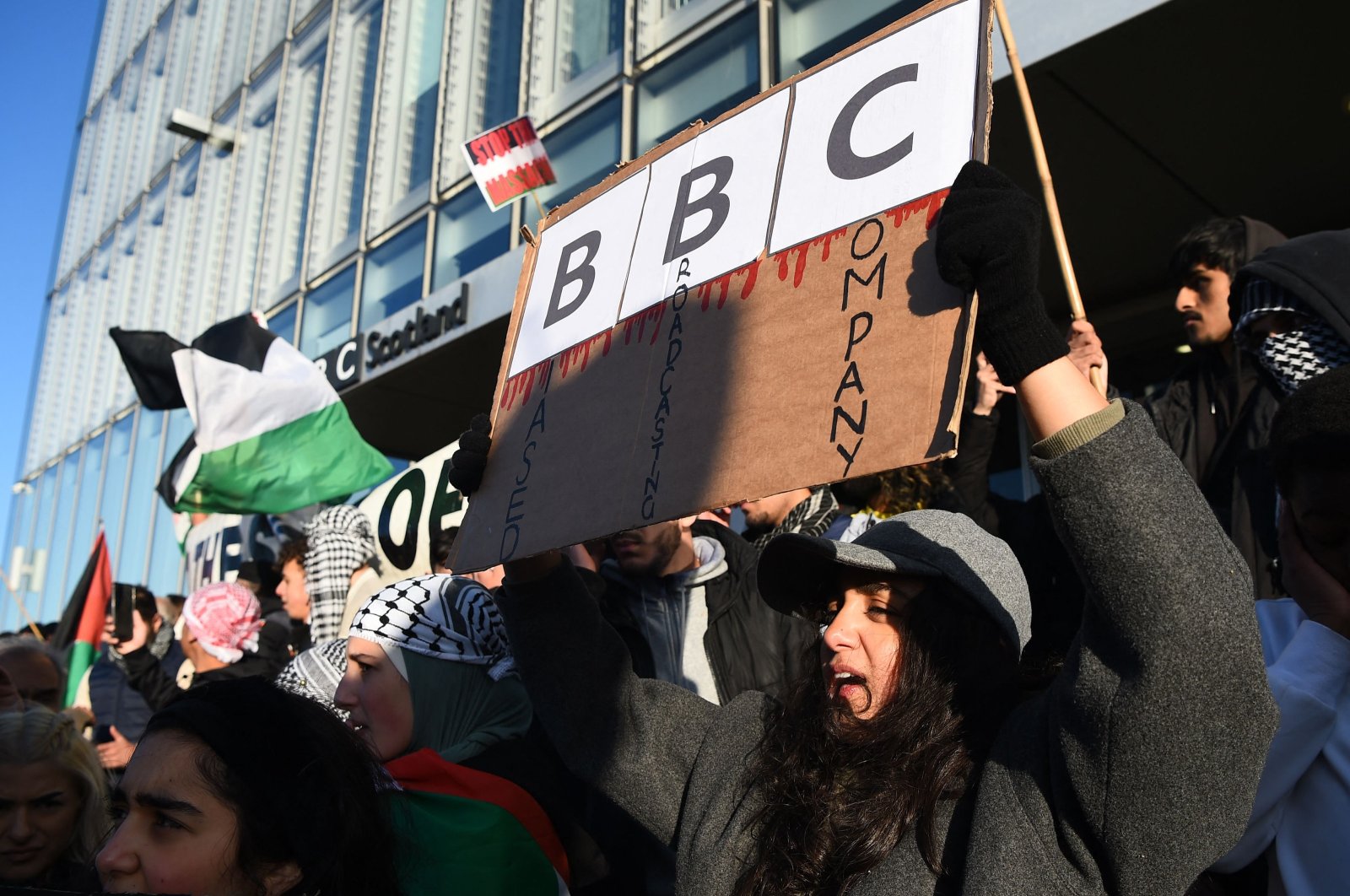 Protesters gather outside the BBC Scotland building as people take part in a demonstration to show solidarity with the Palestinian People, in Glasgow, Scotland, Oct. 14, 2023. (AFP Photo)