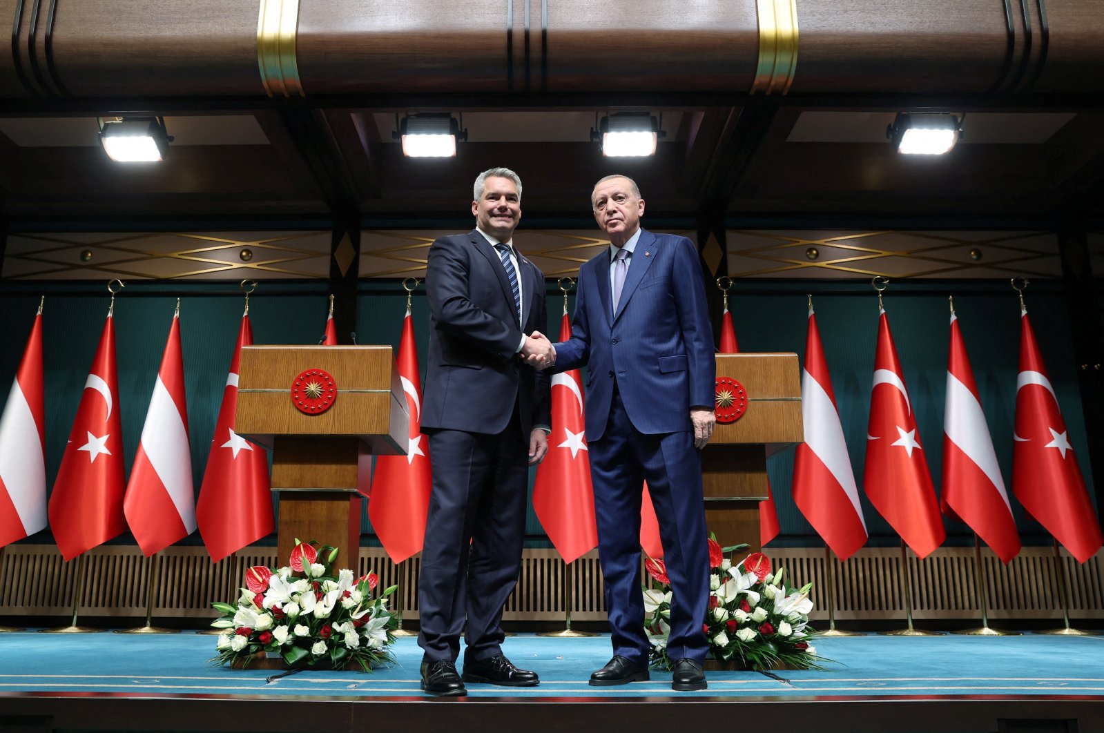 President Recep Tayyip Erdoğan shakes hands with Austrian Chancellor Karl Nehammer (L) during a news conference at the Presidential Palace in Ankara, Türkiye, Oct. 10, 2023. (Reuters Photo)