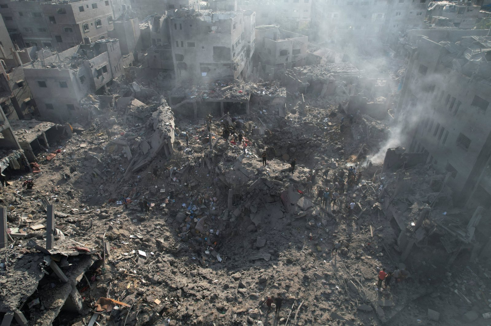 Palestinians gather at the site of Israeli strikes on houses in Bureij in the central Gaza Strip, Palestine, Nov. 2, 2023. (Reuters Photo)