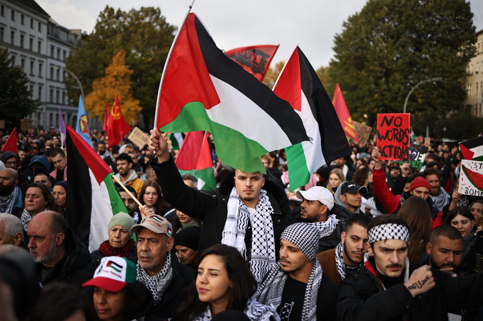 Participants hold Palestine flags during a protest in solidarity with people in Gaza, Kreuzberg district, Berlin, Germany, Oct. 28, 2023. (EPA Photo)