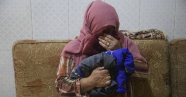 Nur el-Isa reacts as she talks about her child abducted by PKK/YPG terrorists in 2018 in an interview in Tell Abyad, Syria, Nov. 2, 2023. (AA Photo)