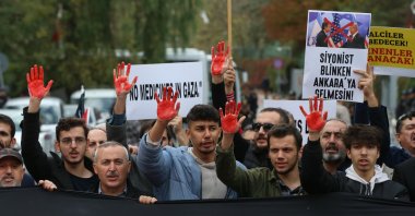 People shout slogans and hold banners reading "Zionist Blinken should not come to Ankara" during a protest against the U.S. secretary of state's visit to Türkiye, and Israel's attacks in the Gaza Strip, in the capital Ankara, Türkiye, Nov. 6, 2023. (EPA Photo)