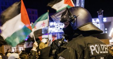 Police officers with a helmet on guards at the scene during a protest in solidarity with Palestinians, in Berlin, Germany, Nov. 4, 2023. (EPA Photo)