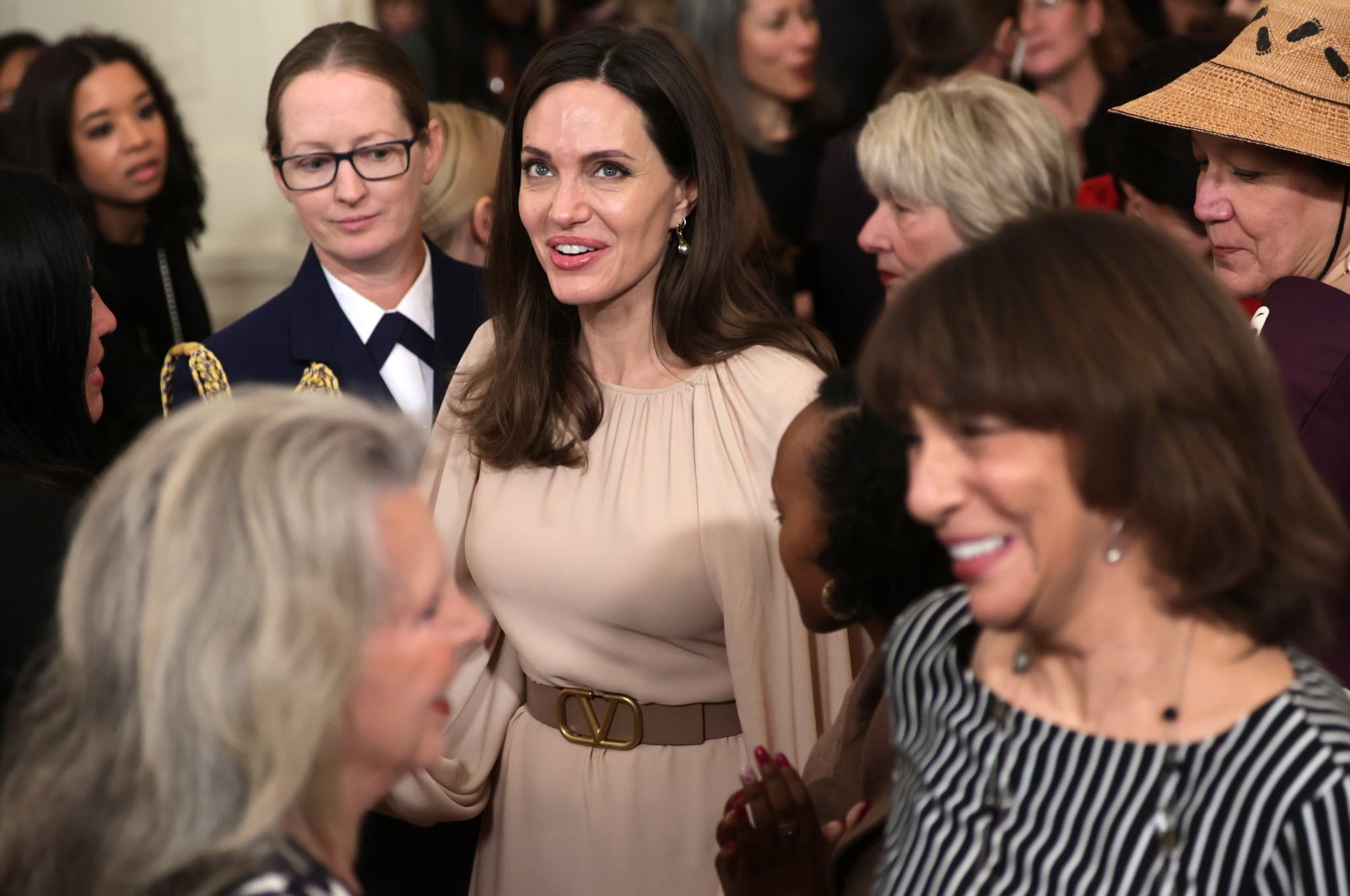 Actor Angelina Jolie leaves after an event to mark the reauthorization of the Violence Against Women Act at the East Room of the White House, Washington, U.S., March 16, 2022. (Getty Images Photo)