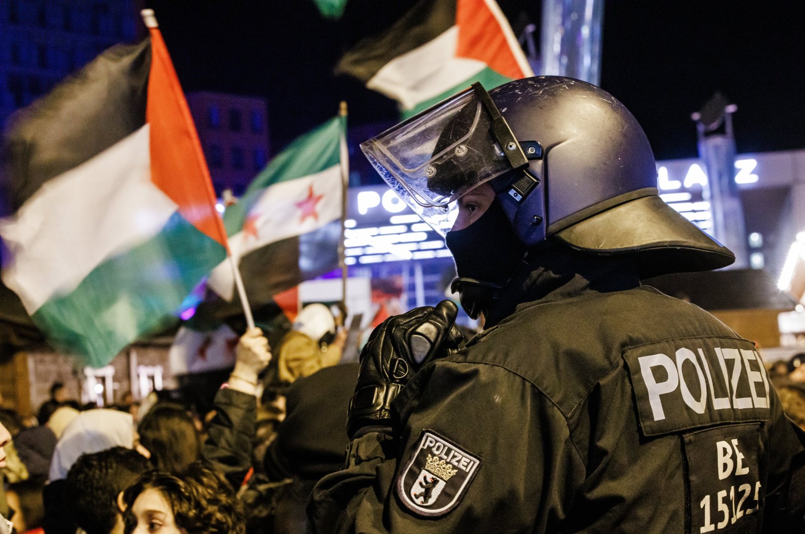 Police officers with a helmet on guards at the scene during a protest in solidarity with Palestinians, in Berlin, Germany, Nov. 4, 2023. (EPA Photo)