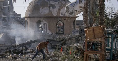 A Palestinian man inspects the rubble of the destroyed Al-Sheikh Zayed mosque following Israeli airstrikes in the northern Gaza Strip, Palestine, Nov. 4, 2023. (EPA Photo)