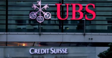 Logos of Swiss banks Credit Suisse and UBS are seen before a news conference in Zurich, Switzerland, Aug. 30, 2023. (Reuters Photo)