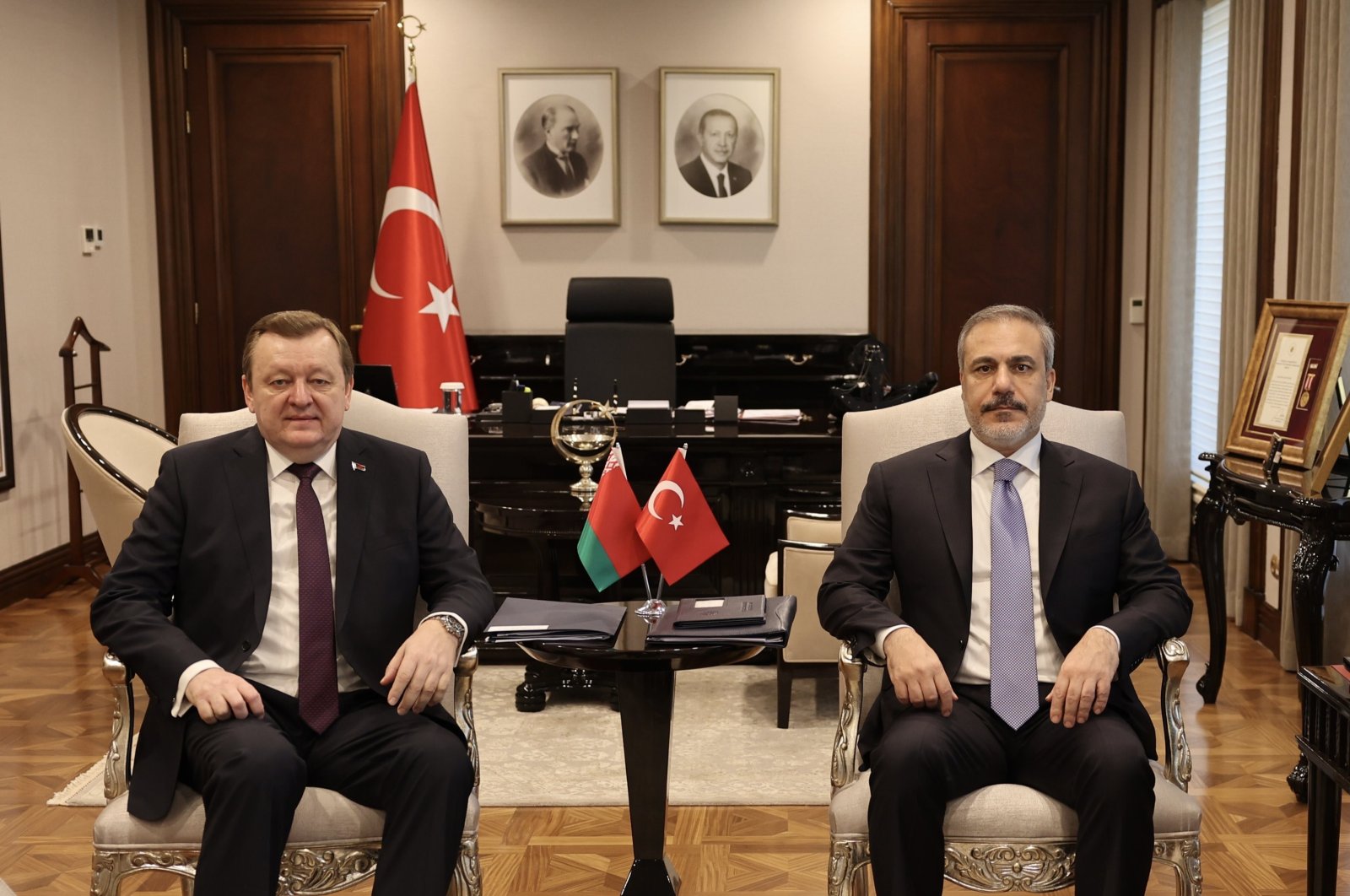 Foreign Minister Hakan Fidan (L) and his Belarussian counterpart Sergei Aleinik pose for a picture ahead of closed-door talks in Ankara, Türkiye, Nov. 7, 2023. (AA Photo)